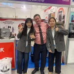 Zhongshan Youya'an Electric Appliance (UCK) team with a B2B client at their food dehydrator manufacturer booth during IEAE Russia.